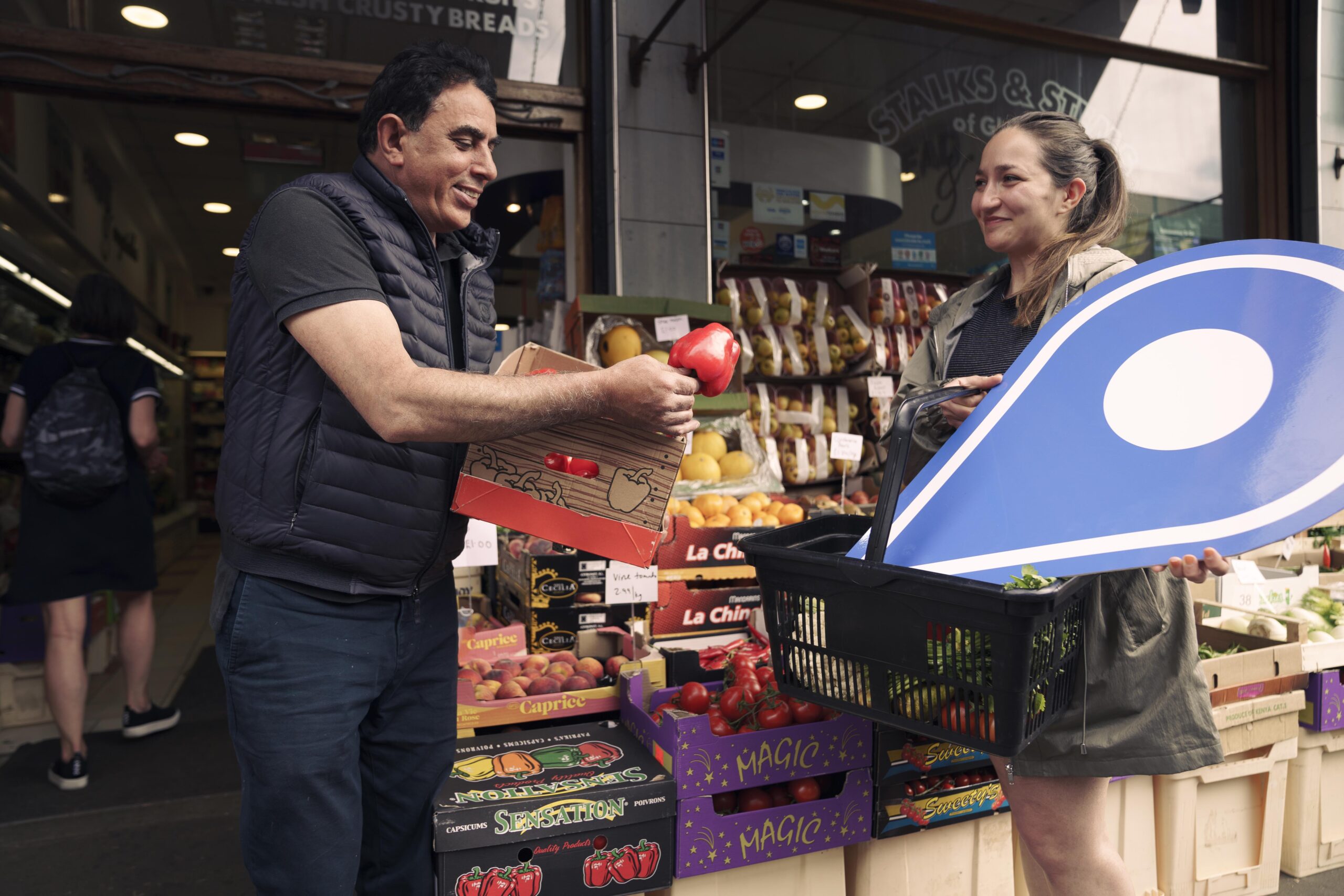 Free first use: Ali Haider (BOTH CORRECT), owner of Stalks and Stems Florist and Greengrocers, left, chats with customer Giuliana Torpiano (BOTH CORRECT). The business, on Pollokshaws Road, Glasgow, is one of several in Shawlands promoting the Scotland Loves Local campaign, encouraging people to choose local and back businesses in their community as part of the national recovery from the Covid-19 pandemic. The campaign is spearheaded by Scotland's Towns Partnership.Media enquiries to Chris Story on 07375 065 728 / chris@messagematters.co.uk