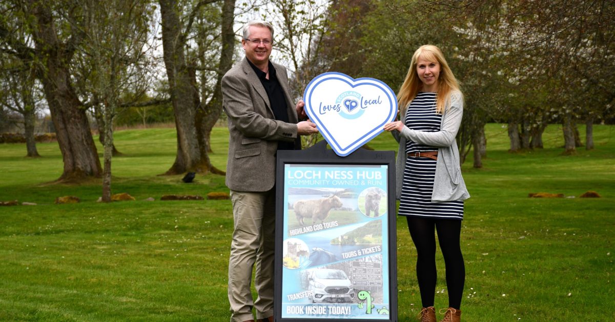 Russell Fraser of Loch Ness Hub and Emma Harrison of Visit Inverness Loch Ness. Visit Inverness Loch Ness supports Scotland Loves Local. Summer 2023. Picture Scotland's Towns Partnership