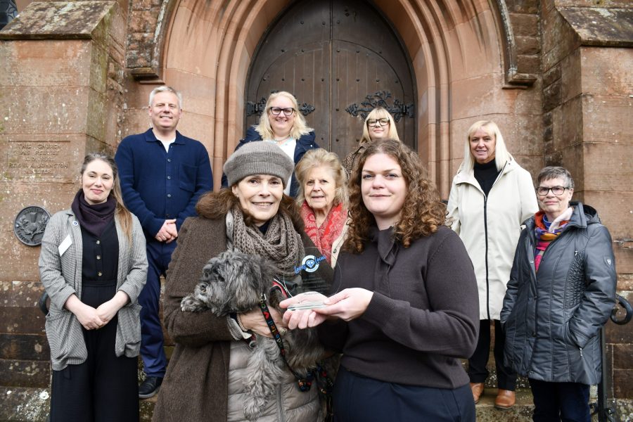 Victoria Cummock, front left, receives the Scotland Loves Local High Street Hero Award for South Scotland from Scotland's Towns Partnership's Rebecca Mather, front right. along with Lockerbie Memorial Church Museum team members, left to right, Gillian Carmoodie, David Taylor, Elly Hurren, Vicky Jardine-Paterson, Kaye Redpath, Crystal Pringle and Nan Rew. Picture: Scotland's Towns Partnership October 2026